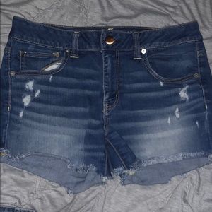 Frayed dark denim shorts